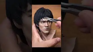 AmazingChina: Bruce Lee Sculpture ("Game of Death" Yellow Jumpsuit)
