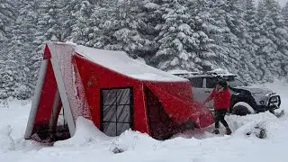 OUR TENT WAS COVERED IN SNOW DURING THE SNOWSTORM