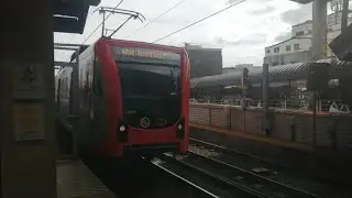 an LRT-1 gen 4 (trainset 1) arriving at EDSA station