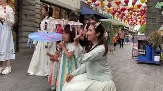 International students visit ancient town to celebrate Dragon Boat Festival