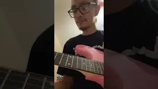 Cheap guitar to throw a hello kitty pickguard and gold gretsch humbucker (pre-apocalypse) unplugged