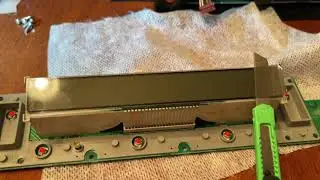 Removing the protective film from the housing and communal services screen of the climate control...