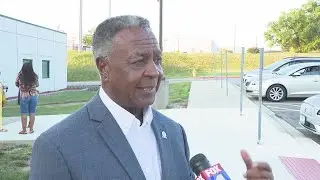 Frank White speaks with residents at town hall in Raytown