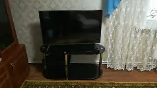 Тумба под телевизор из стекла 