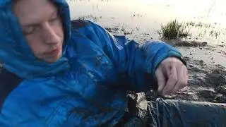 Muddy snowsuit