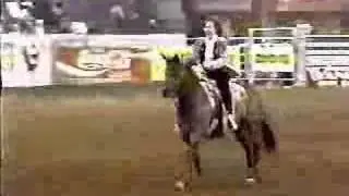Reba McEntire - riding at the rodeo