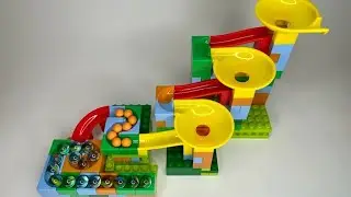 Colourful marbles rolling down, marble run races, Marble Run easy fun