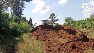 Dozer cutting stock file to make road