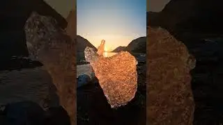 An Incredible View of a Bonfire Beside a Beautiful Lake