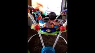 Baby does the Itsy Bitsy spider with Barney!