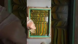 Linear soap swirl. Pouring down the sides of the mold.  Cold process soap making.
