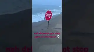 stop sign on the beach