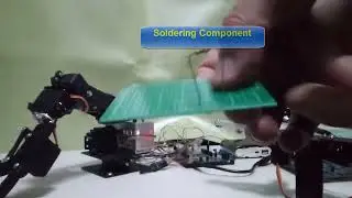 Work holding Robotic Arm for Electronic Workshop