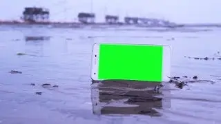 Smartphone with Green Screen on the Beach | Stock Footage - Videohive