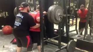 545 pounds 247kg raw squat with wraps.