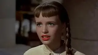 Giantess girl captures miniature Gulliver in The Three Worlds Of Gulliver (1960)
