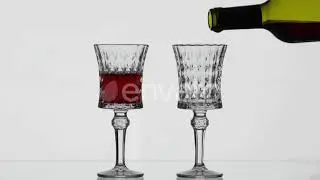 Rose Wine. Red Wine Pour in Two Wine Glasses Over White Background | Stock Footage - Envato elem...