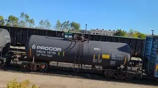 CN L554 EMD GP38-2 4709 & GP38-2 4732 are shoving it down the Rail cars in Aldershot Yard