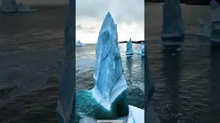 Jagged pillars of ice floating out to sea from the Ilulissat Icefjord #greenland