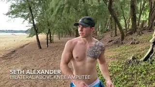 Bilateral Above Knee Prosthetics User Walking On The Beach