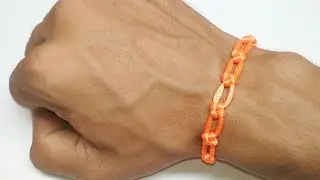 Making a bracelet out of string. Make a beautiful bracelet out of plain yarn.