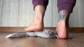 ASMR trample a soft toy. Bare feet.
