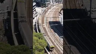 Aerial view of Melbourne Metro train traveling between Southern Cross & Flinders St Stations