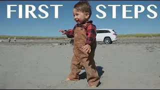 Cute Baby takes first steps on the beach of the Pacific Ocean!