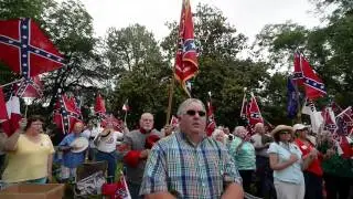 Confederate flag supporters sing I Wish I Was in Dixie