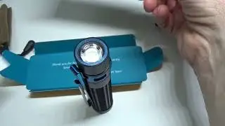 Olight Baton 3 Pro Max Flashlight. 2500 Lumens -- magnetic charging base.