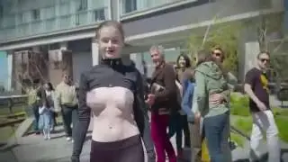 ambient media - Topless model, 23, walks through New York
