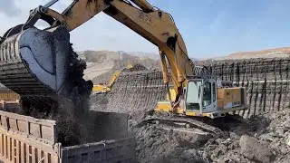 Liebherr 974 Excavators Loading Mercedes & MAN Trucks - Ascon Ltd