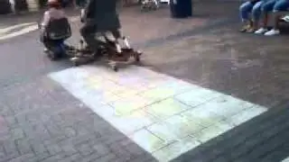 Old couple - husband whips wife.