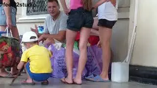 Lady in flip-flops standing in flamingo stance