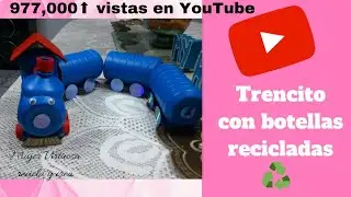 Trencito de juguete hecho con botellas de lejía o cloro.Trenzinho com material reciclado