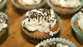 Delicious orange muffins with cream