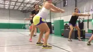 Resisted Rotational Squat Hops 