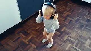 1½ year old girl rocks out to heavy metal