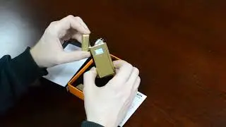 Электроимпульсная зажигалка в подарочной коробке  XT 5005