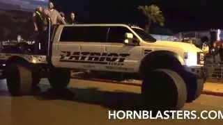 DieselSellerz.com Patriot rear wheel steering Ford at SEMA 2015 parade heavy d cruise super duty