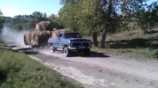 Doug hauling bales.
