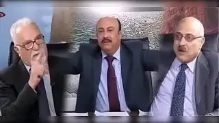 Two Gentlemen Help the Interviewer To Assemble an IKEA Desk