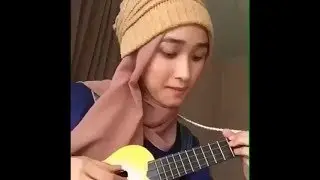 playing the guitar with one hand ..... magical