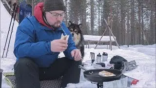 A quick Winter snack in the forest with my dog Nogah
