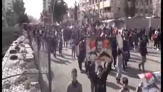 Thousands of people in the neighborhood Kafarsouseh out in a massive march in support of the Army