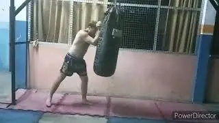 Heavy bag kickboxing drills. Several rounds + tire and pullups