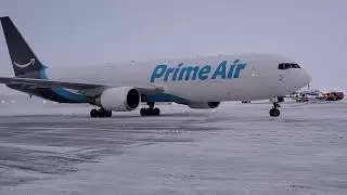 Prime Air 767 deep snow taxi to parking.