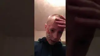 Тату на щеке