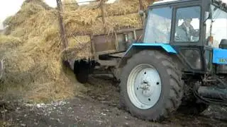 мтз-1025..выгрузка соломы..