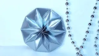 Luxury origami geometry flower - star. Origami ceiling rose. Wall decoration ideas.